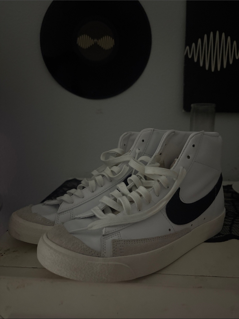 Nike High-Top Sneakers in White with Black Swoosh